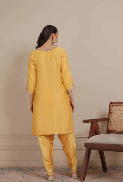 Yellow kurta paired with Dhoti Set